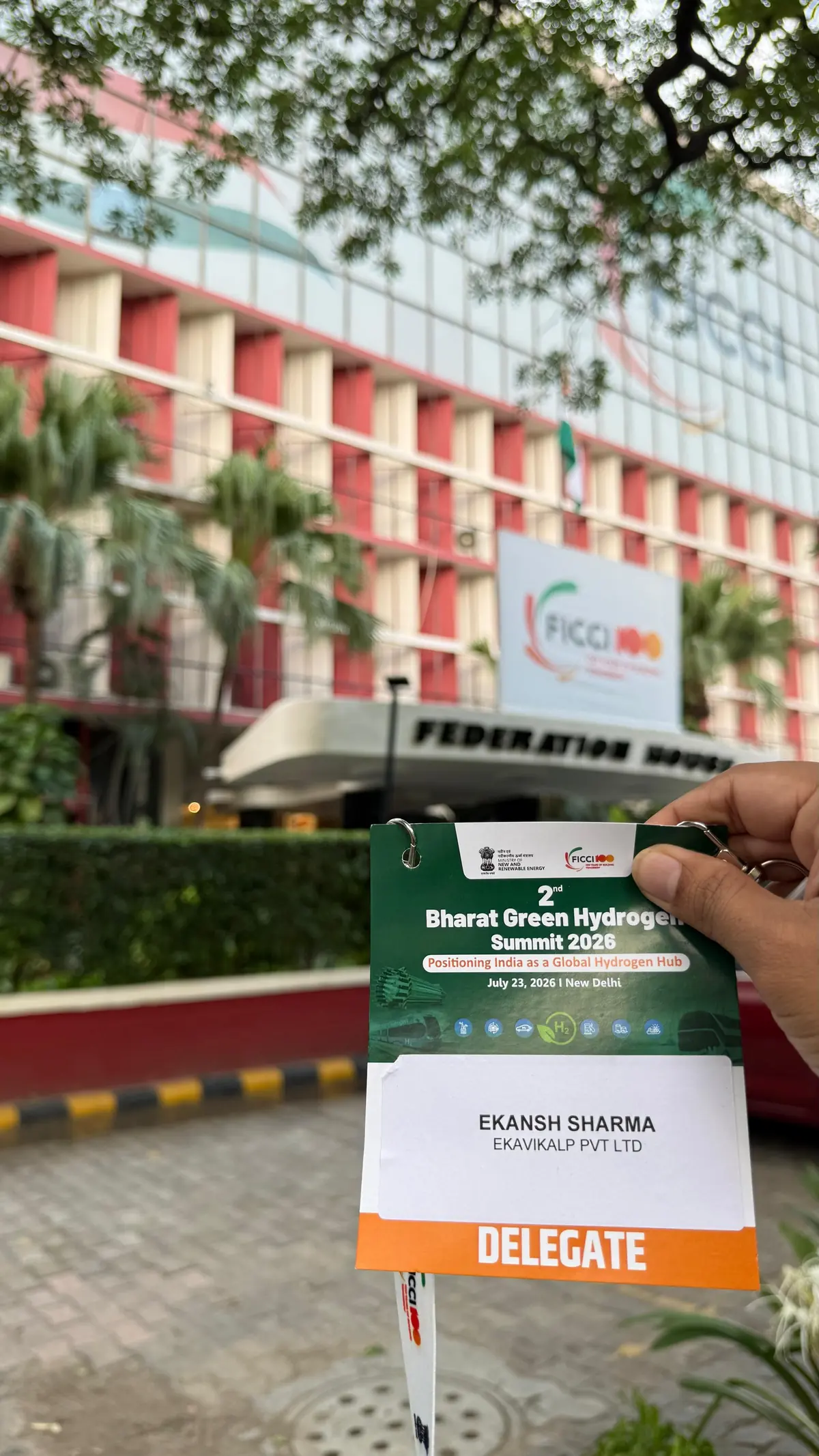 Ekansh Sharma's delegate badge outside FICCI Federation House for the 2nd Bharat Green Hydrogen Summit 2026